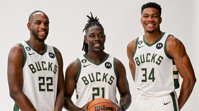 Sep 25, 2022; Milwaukee, WI, USA; Milwaukee Bucks forward Khris Middleton (22), guard Jrue Holiday (21) and forward Giannis Antetokounmpo (34) pose for a picture during media day at the Fiserv Forum.